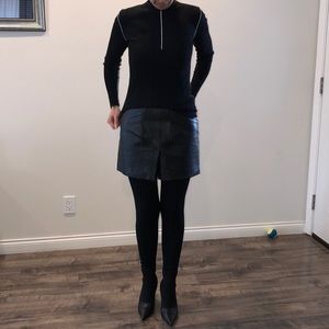 Mini leather skirt with pockets.